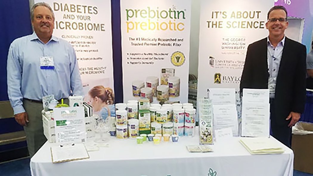 photo of Ron Walborn Jr and Greg Cooper presenting Prebiotin at Diabetes Educator Conference