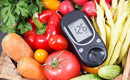 photo of glucose meter with healthy foods